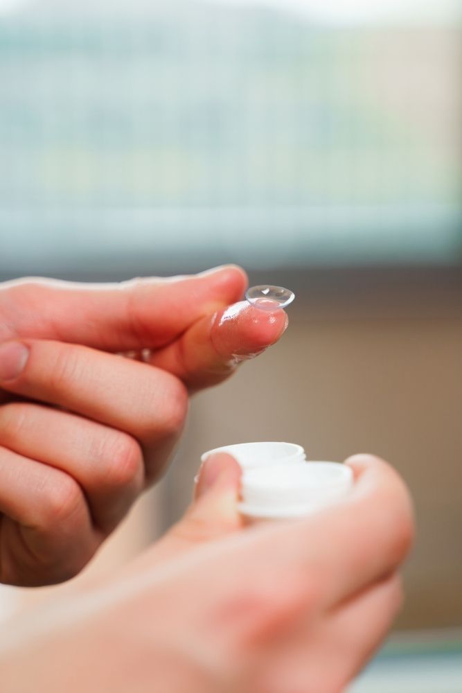 Person experiencing eye discomfort